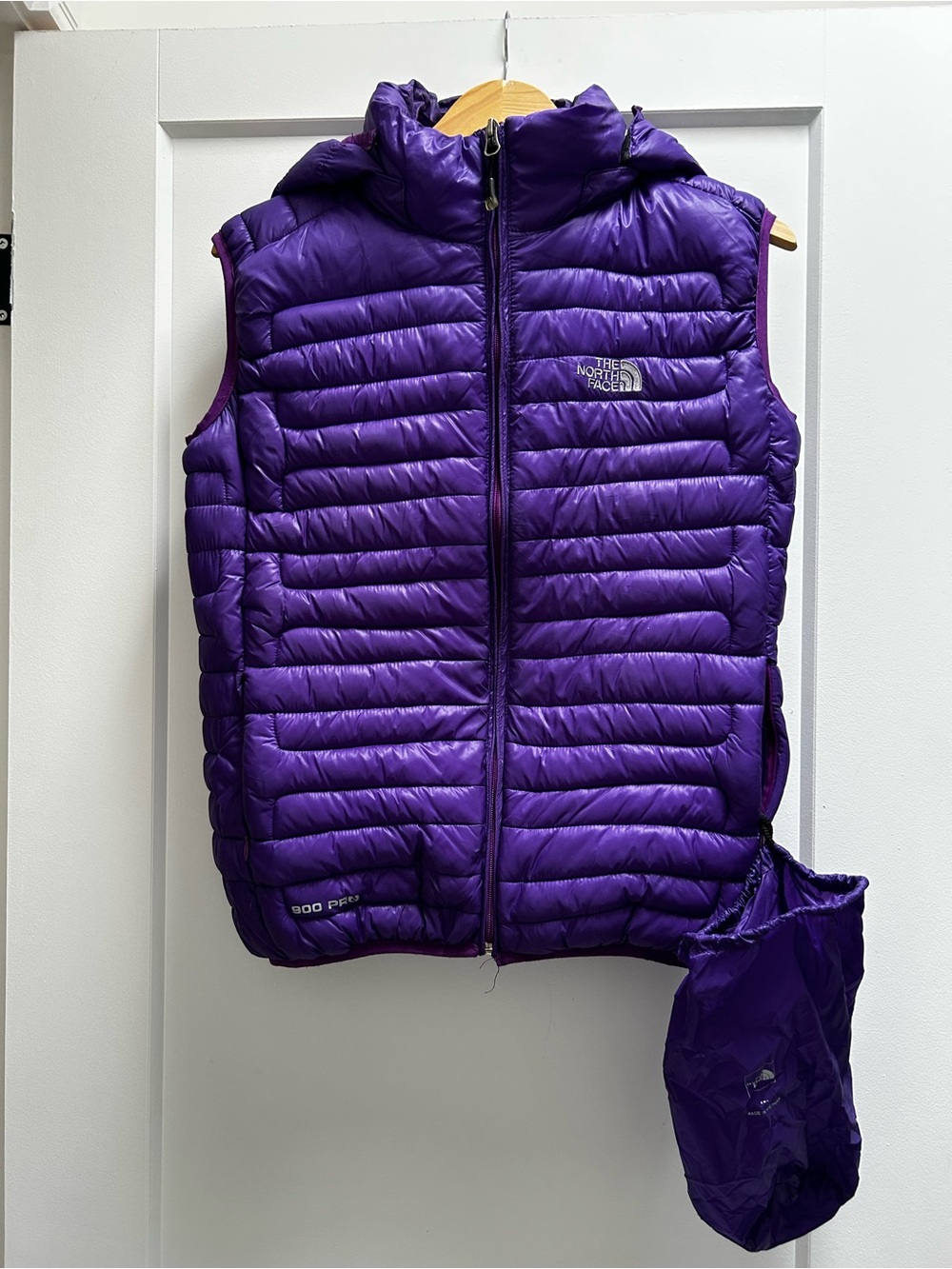 The North face Doudoune femme avec capuchon mauve gr Médium (fait small)